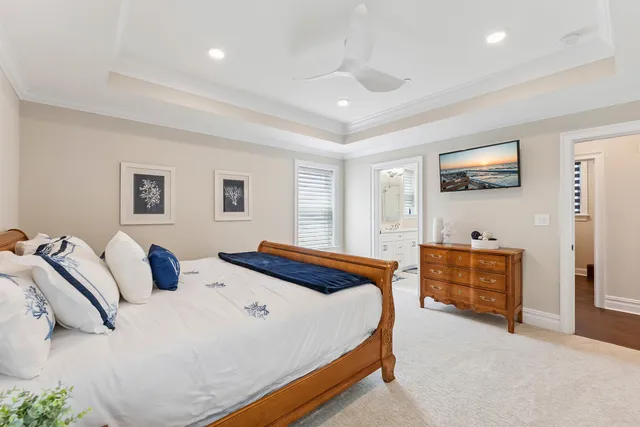 a bedroom with bed and window