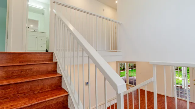a view of room with a ceiling fan