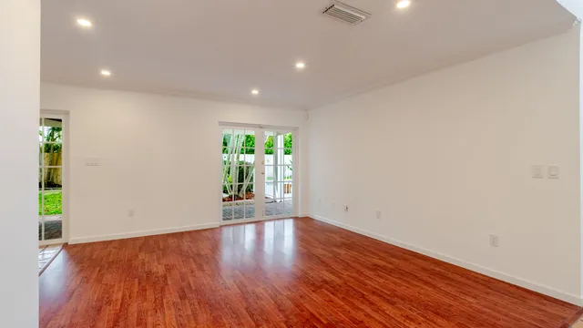 a bathroom with a white bath tub with a white shower curtain