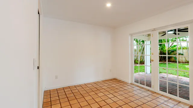 an aerial view of a house with yard swimming pool and outdoor seating