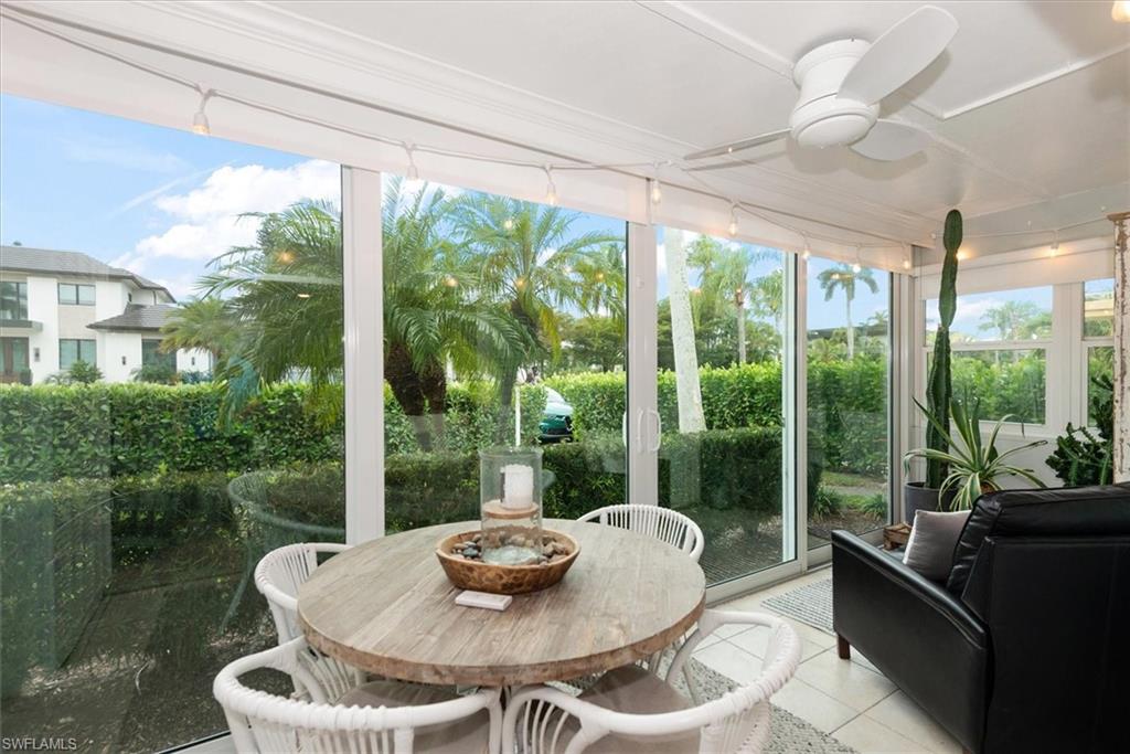 291A 8th Avenue South, Unit 291A Naples, FL 34102 - Photo 6 of 25 Sunroom / solarium with tile patterned floors