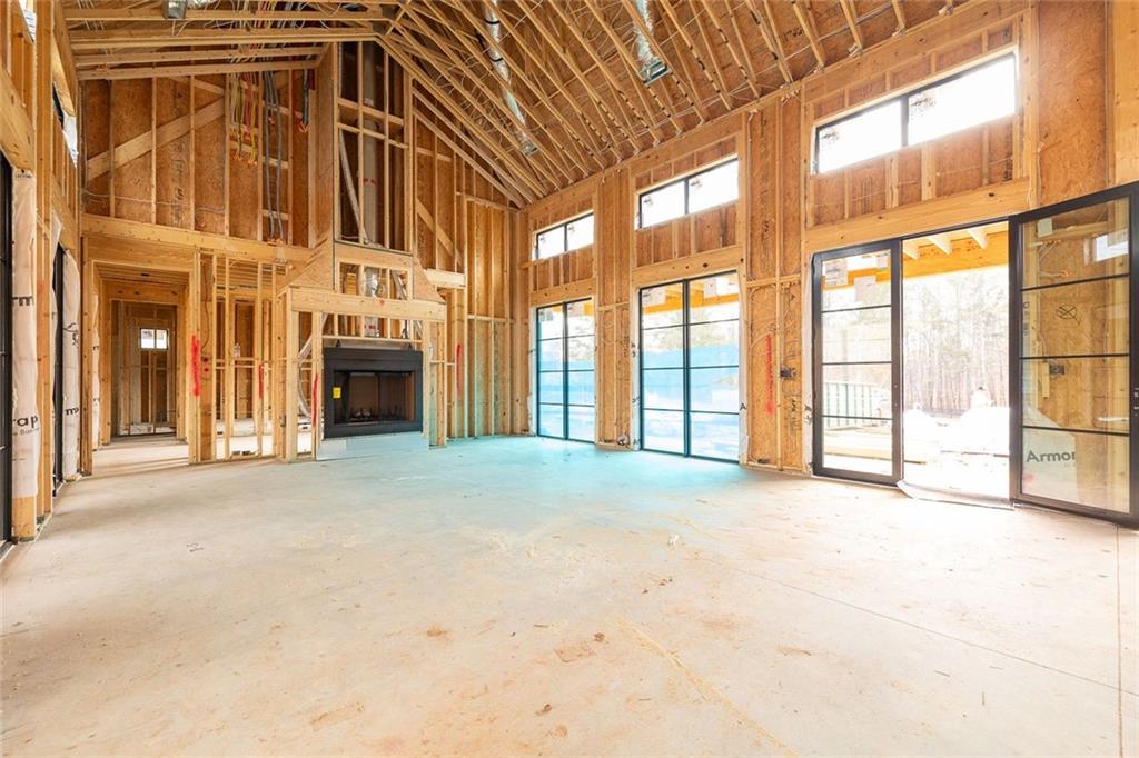 1350-a J A J Land Road Canton, GA 30115 - Photo 15 of 23 a view of an empty room with a fireplace and a window