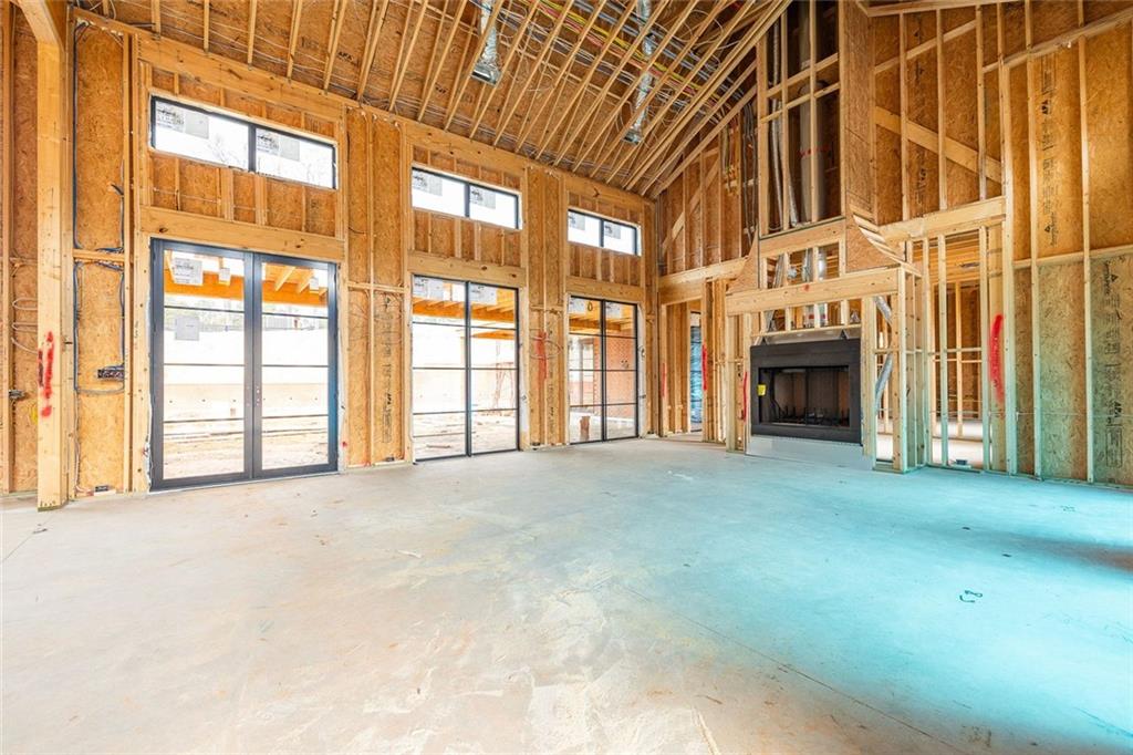 1350-a J A J Land Road Canton, GA 30115 - Photo 16 of 23 a view of an empty room with a fireplace and a window
