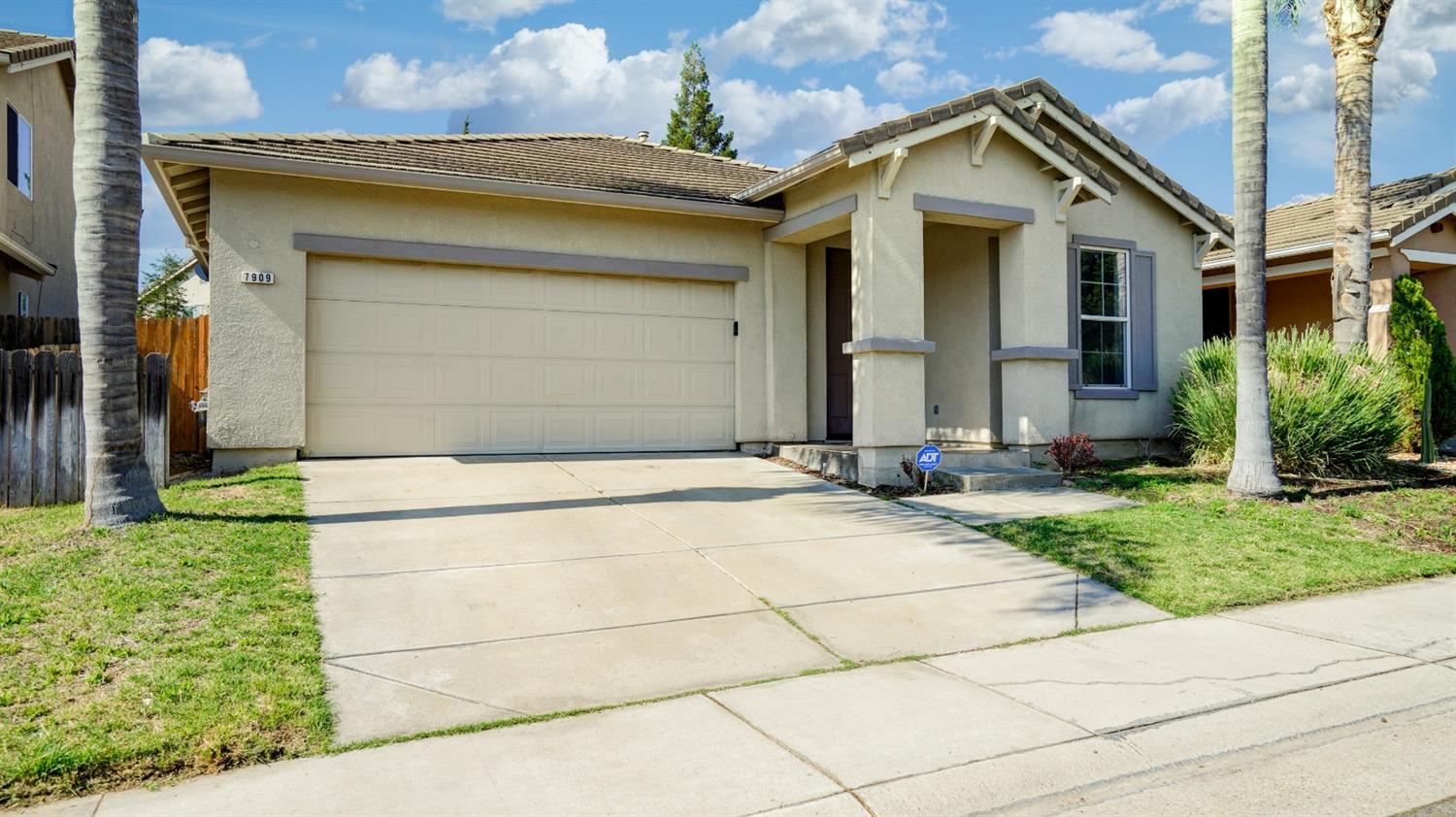 7909 Golden Ring Way Antelope, CA 95843 - Photo 1 of 1 a front view of a house with a yard and garage