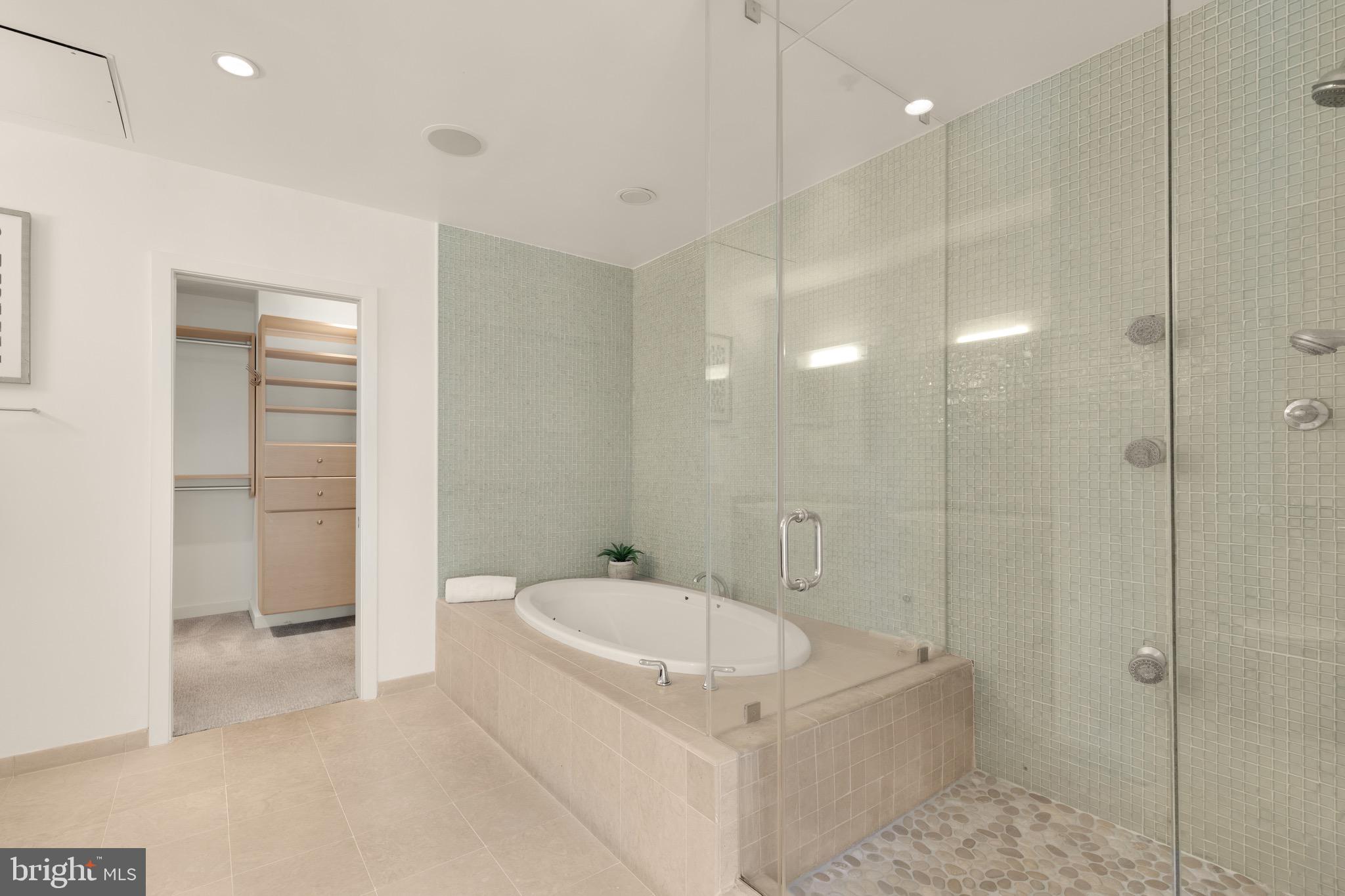 1401 Church Street Northwest, Unit 523 Washington, DC 20005 - Photo 13 of 27 a bathroom with a bathtub and shower