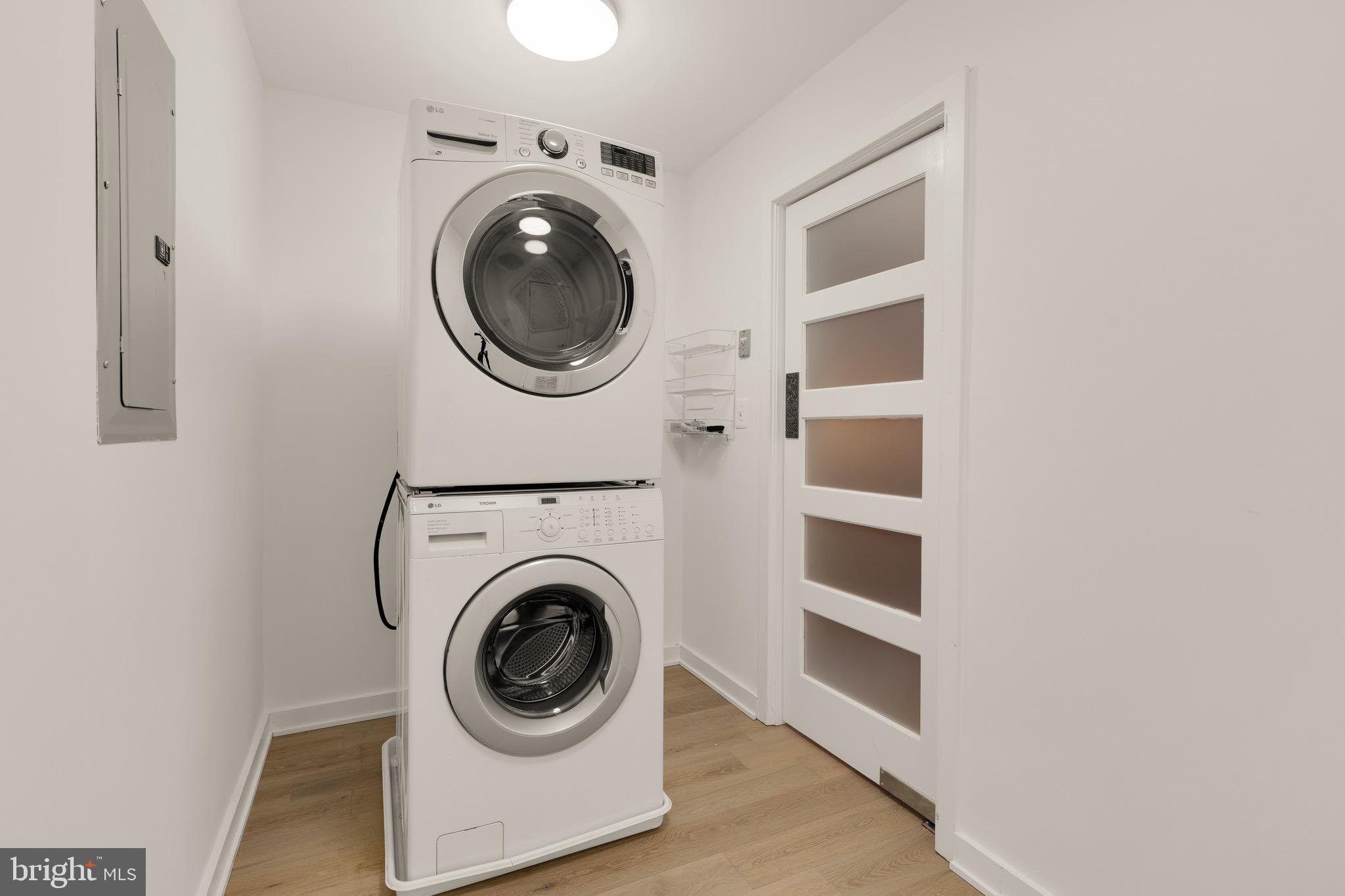 1401 Church Street Northwest, Unit 523 Washington, DC 20005 - Photo 9 of 27 a utility room with dryer and washer