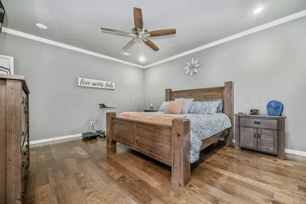 a bedroom with a bed and cabinets