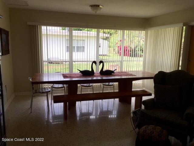 700 Espanola Way Melbourne, FL 32901 - Photo 8 of 15 a view of a dining room with furniture window and outside view