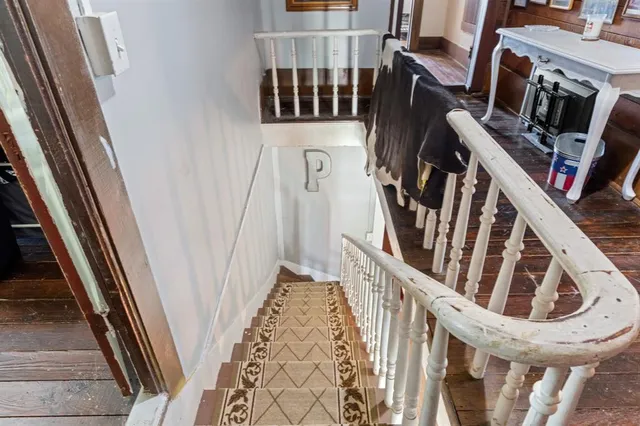 a view of cabinets a washer and dryer