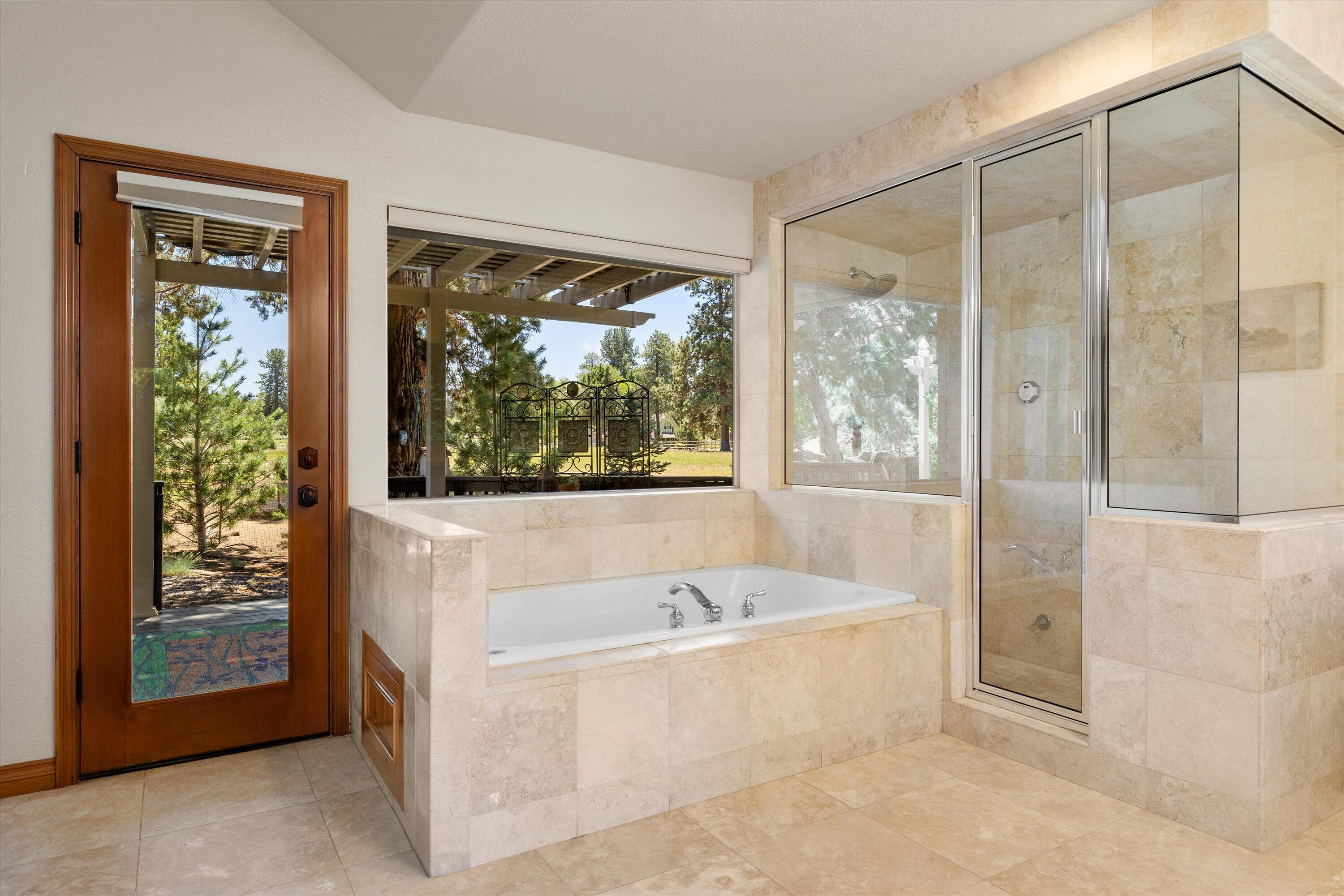 60604 Woodside Road Bend, OR 97702 - Photo 19 of 99 primary bathroom with Jacuzzi tub and steam/regular shower
