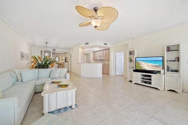 a kitchen with a sink cabinets and appliances