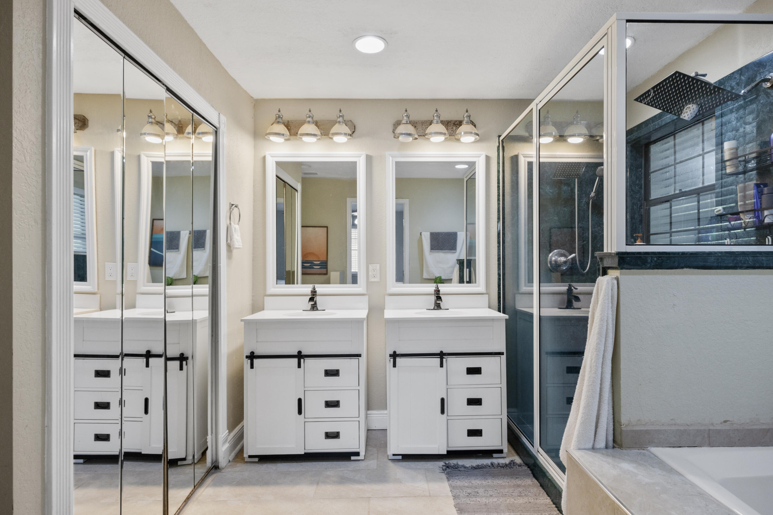 6106 Barnes Road Crestview, FL 32536 - Photo 18 of 49 a bathroom with a double vanity sink mirror and double