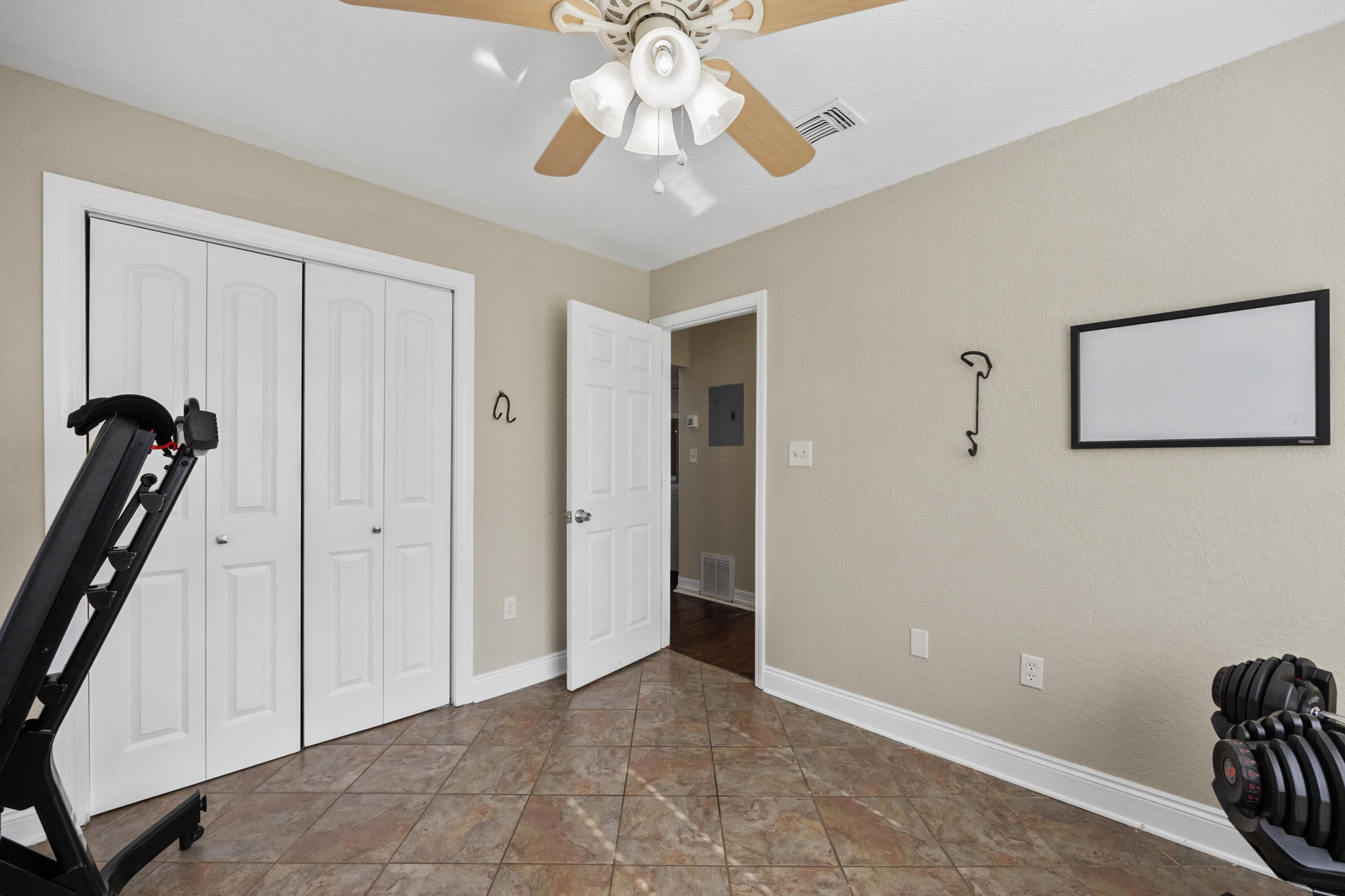 6106 Barnes Road Crestview, FL 32536 - Photo 23 of 49 a view of a livingroom with a chandelier