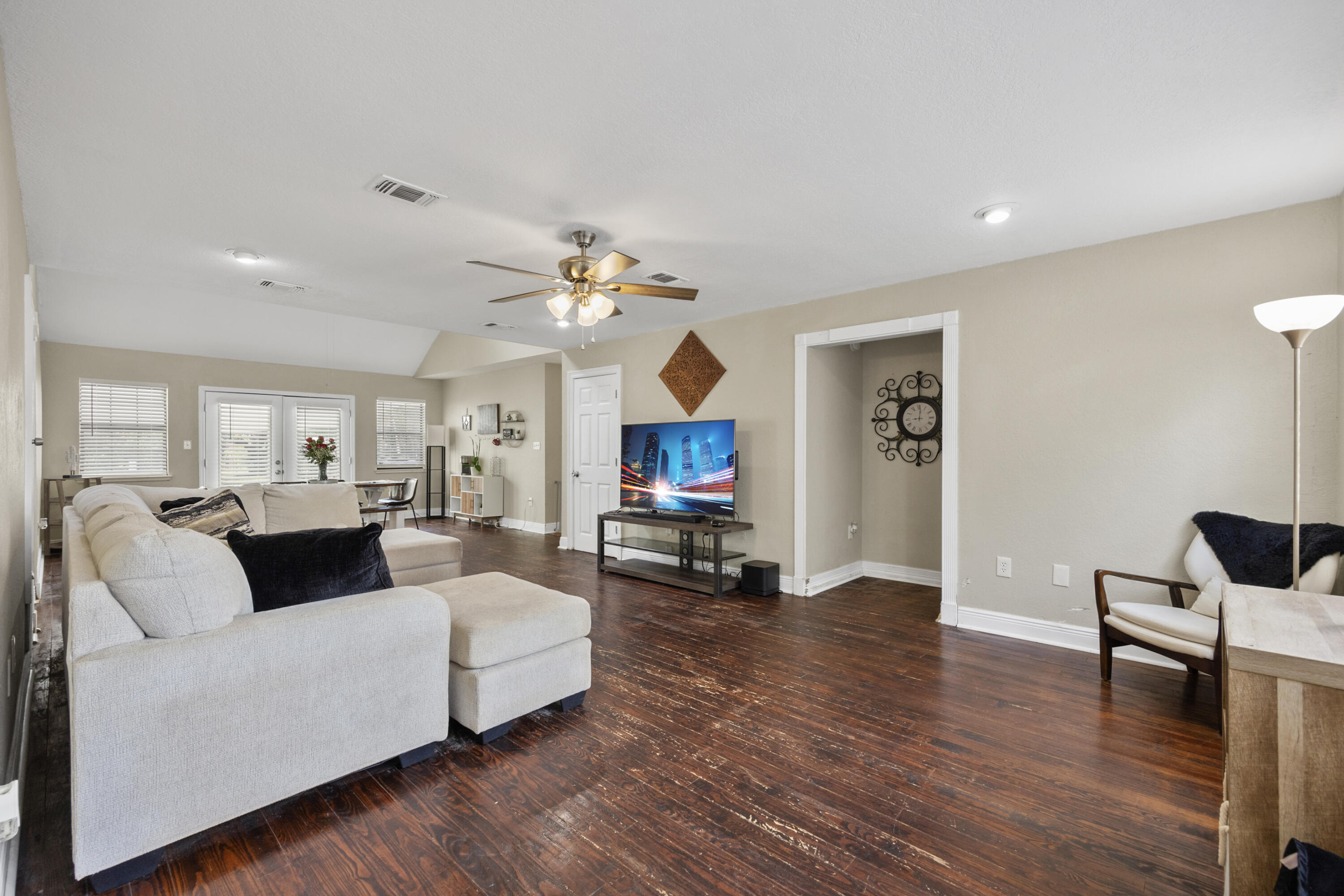 6106 Barnes Road Crestview, FL 32536 - Photo 4 of 49 a living room with furniture and a wooden floor