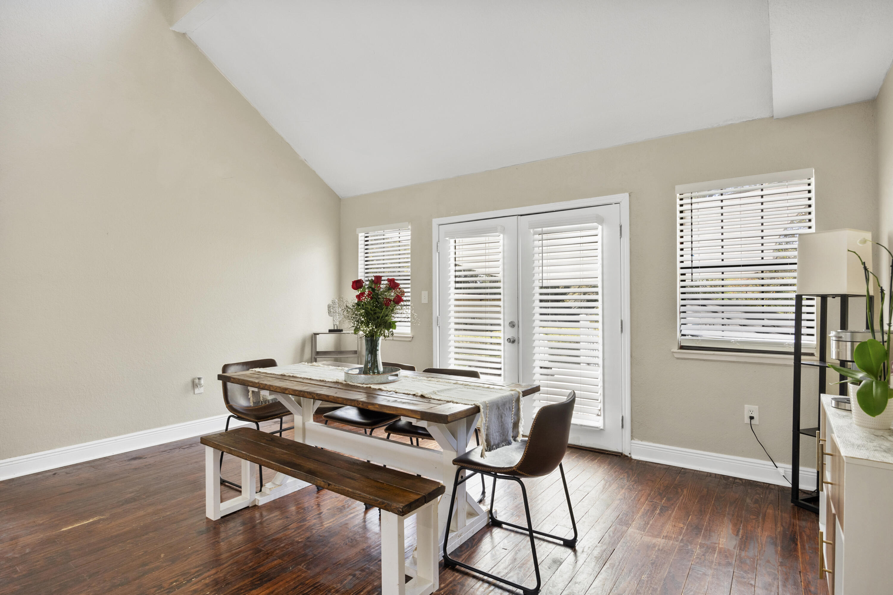 6106 Barnes Road Crestview, FL 32536 - Photo 7 of 49 a view of a dining room with furniture and wooden floor