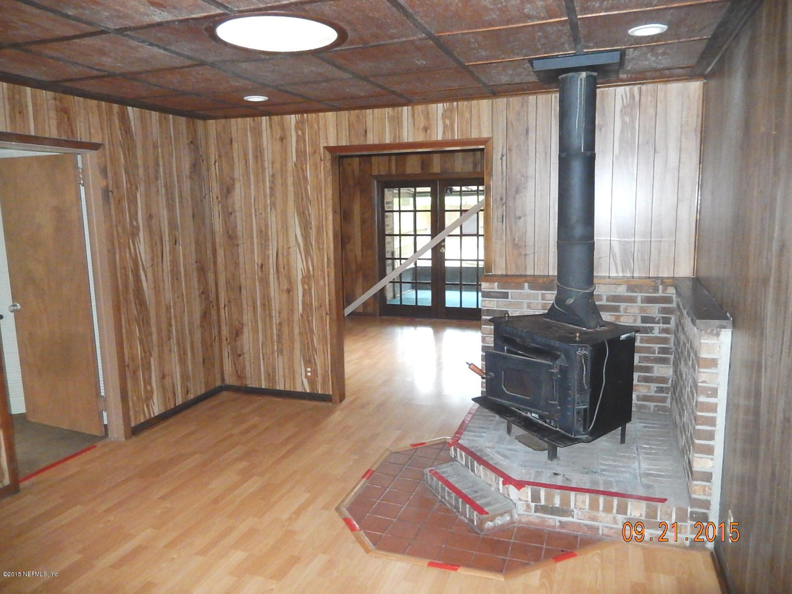 858 Granville Road Jacksonville, FL 32205 - Photo 6 of 24 a living room with furniture and a fireplace