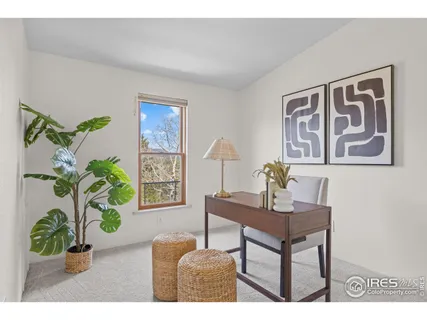 a white bath tub sitting next to a white sink