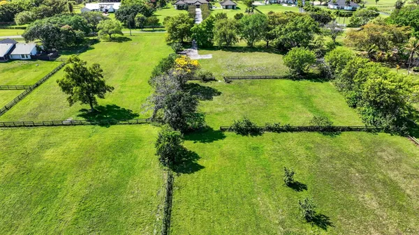 a view of a lake with a yard