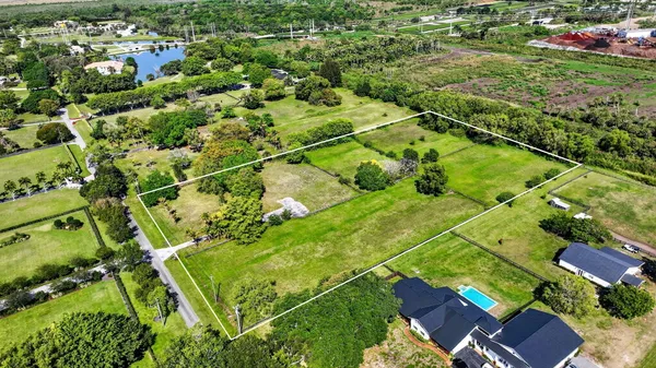 a view of a lush green field