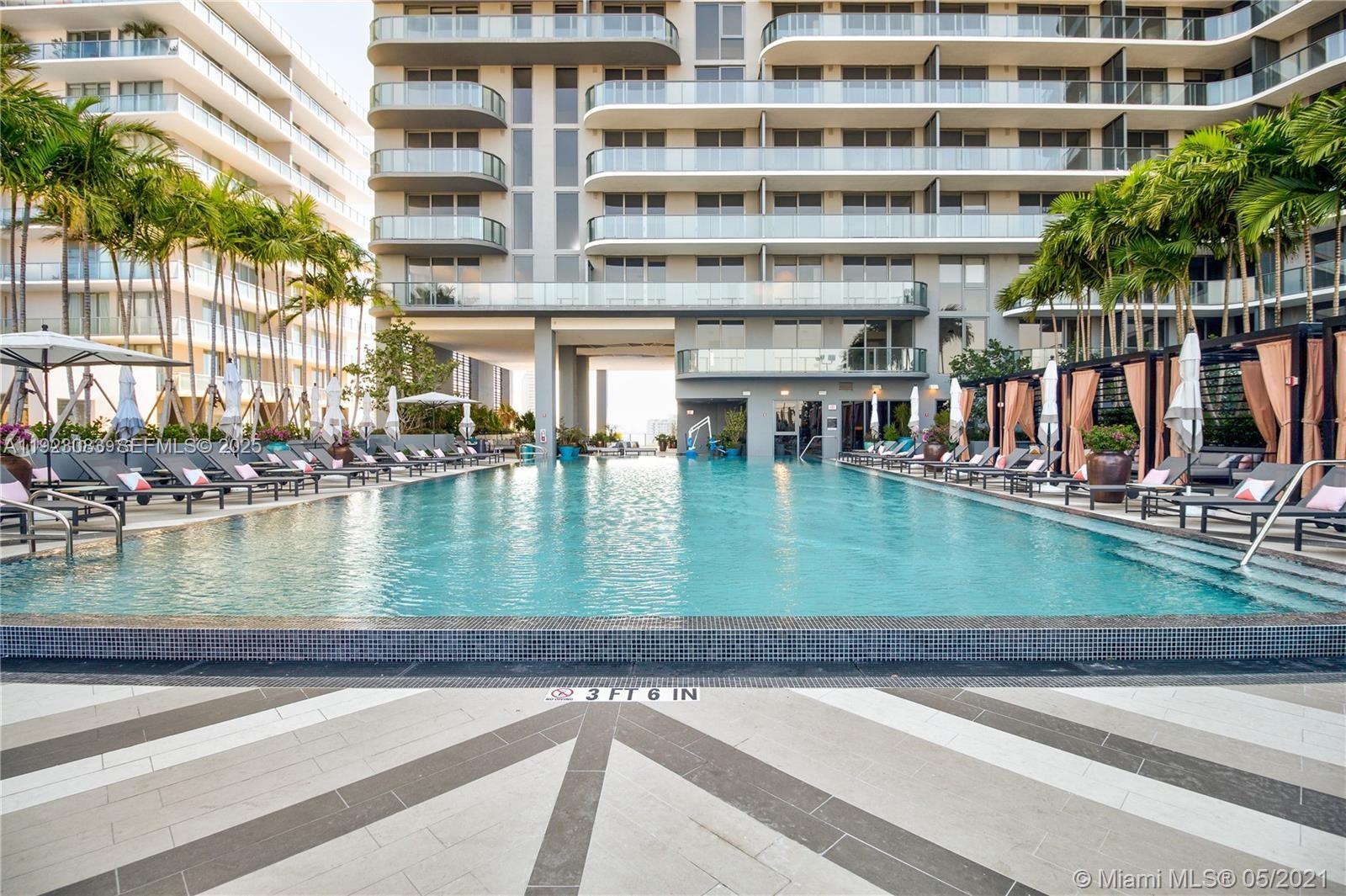 121 Northeast 34th Street, Unit 1604 Miami, FL 33137 - Photo 24 of 53 a view of pool with outdoor seating