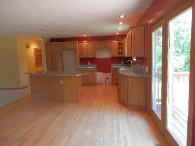 6225 Farr Road Manistee, MI 49660 - Photo 3 of 30 Oak hardwood floor in kit & dining area