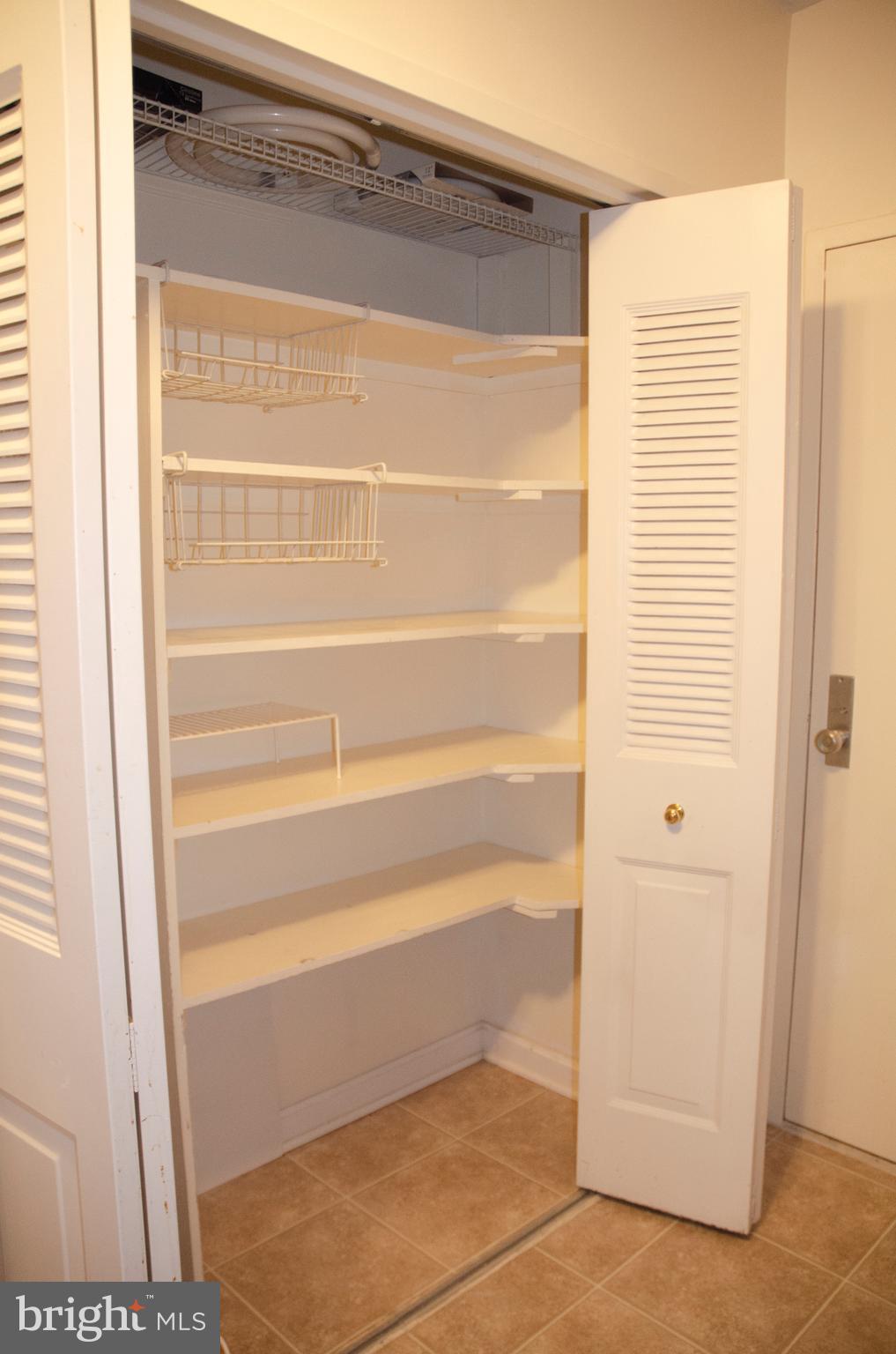 4141 North Henderson Road, Unit 104 Arlington, VA 22203 - Photo 14 of 32 Kitchen pantry
