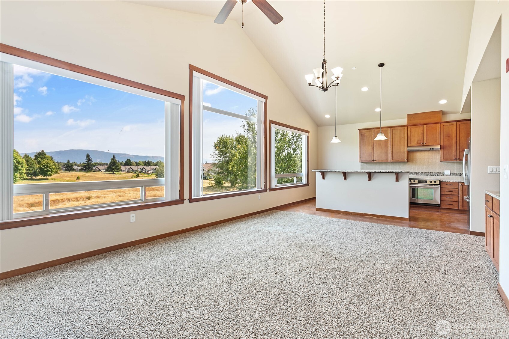 a view of a kitchen with furniture and a kitchen