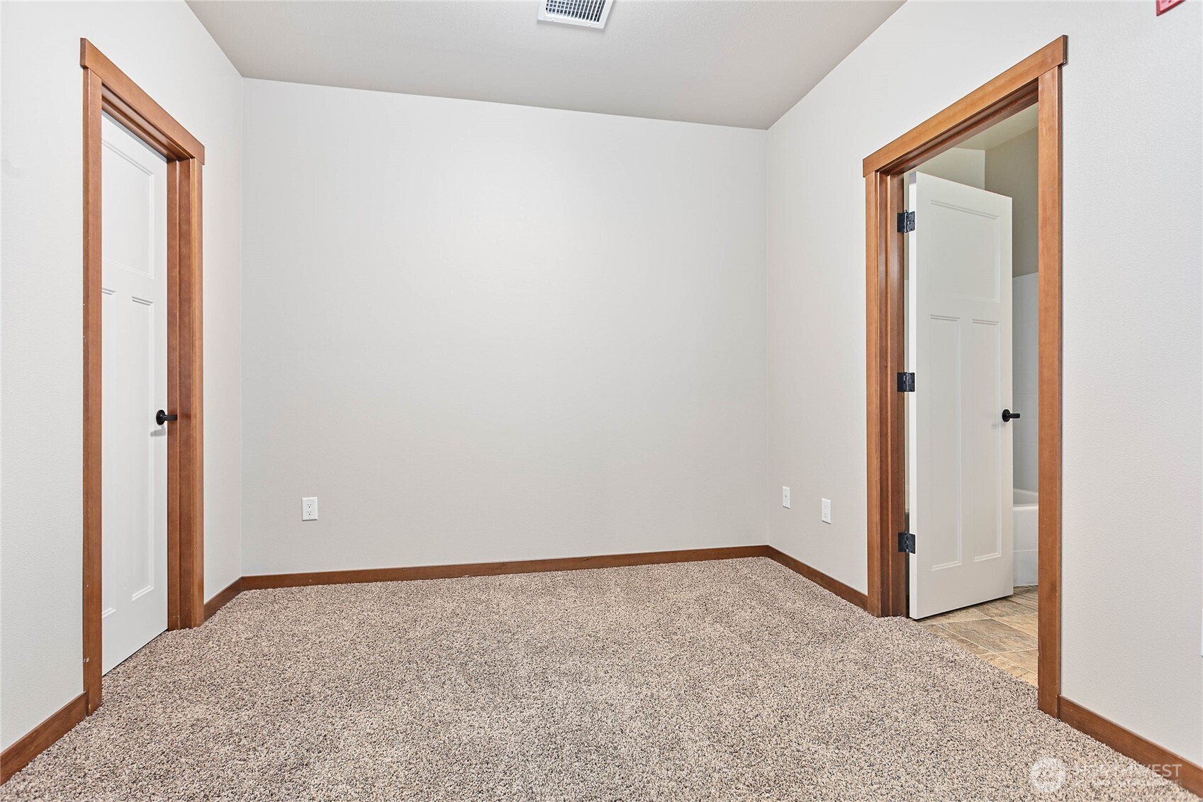 8780 Depot Road, Unit 308 Lynden, WA 98264 - Photo 13 of 36 an empty room with windows