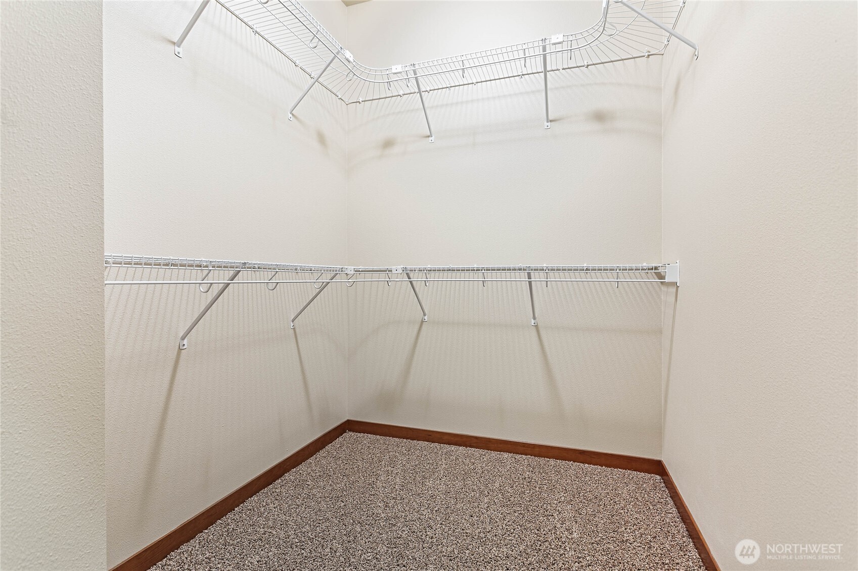 8780 Depot Road, Unit 308 Lynden, WA 98264 - Photo 19 of 36 a view of a room with racks on the wall