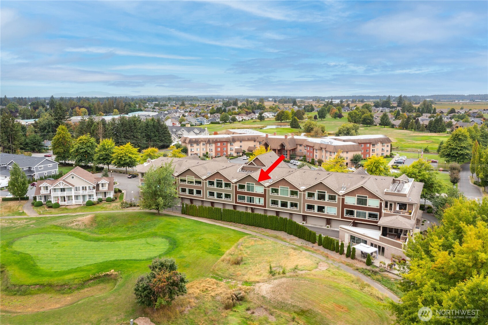8780 Depot Road, Unit 308 Lynden, WA 98264 - Photo 2 of 36 an aerial view of residential houses with outdoor space