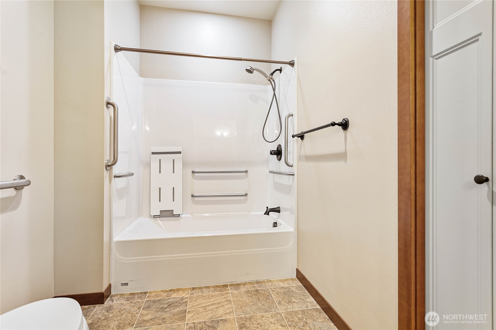 8780 Depot Road, Unit 308 Lynden, WA 98264 - Photo 21 of 36 a bathroom with a bathtub and a shower