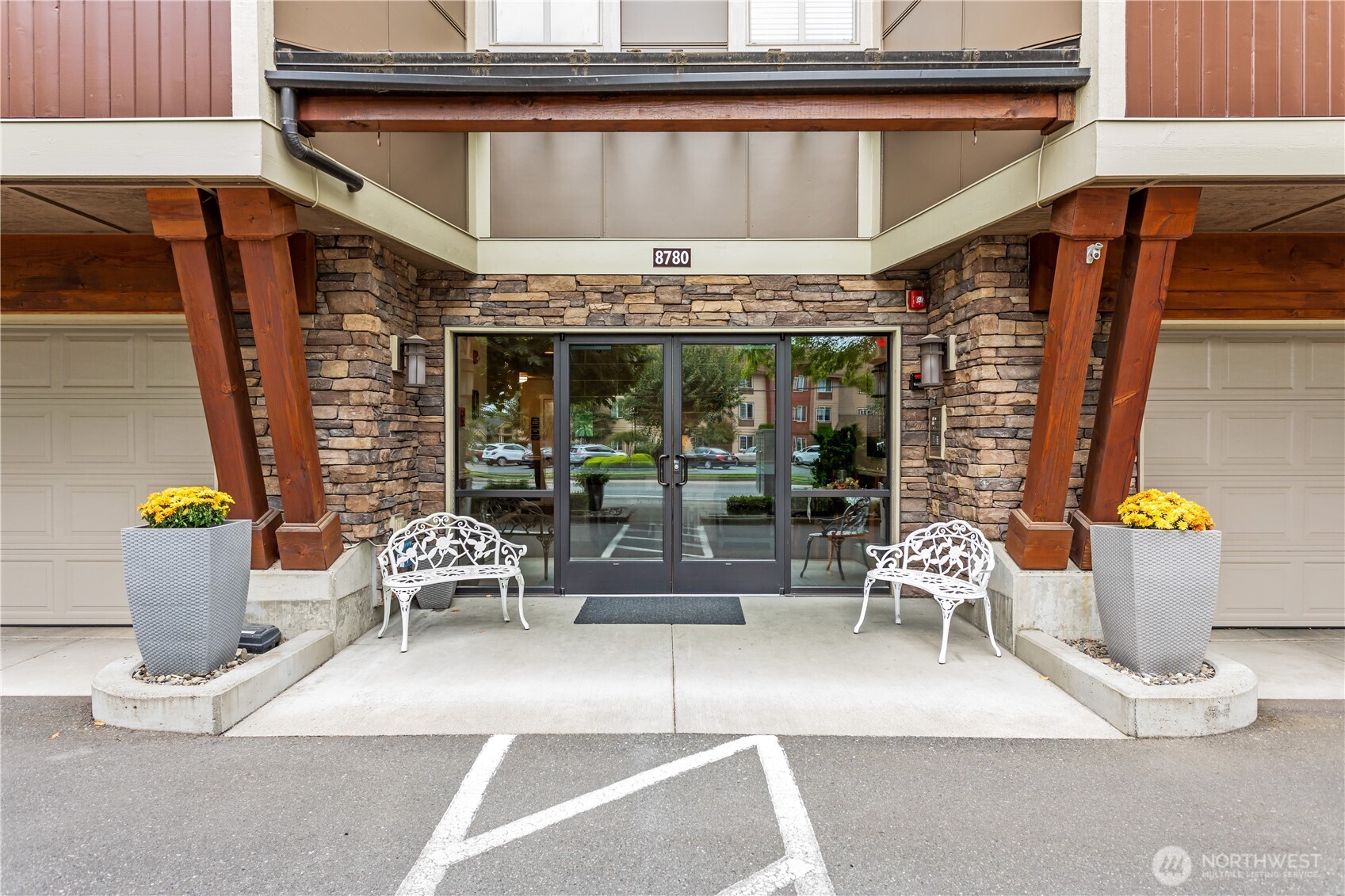 8780 Depot Road, Unit 308 Lynden, WA 98264 - Photo 34 of 36 a view of patio with dining table and chairs