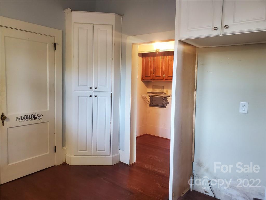 107 South Ridge Avenue, Unit 107 Kannapolis, NC 28083 - Photo 18 of 38 a view of a hallway with wooden floor