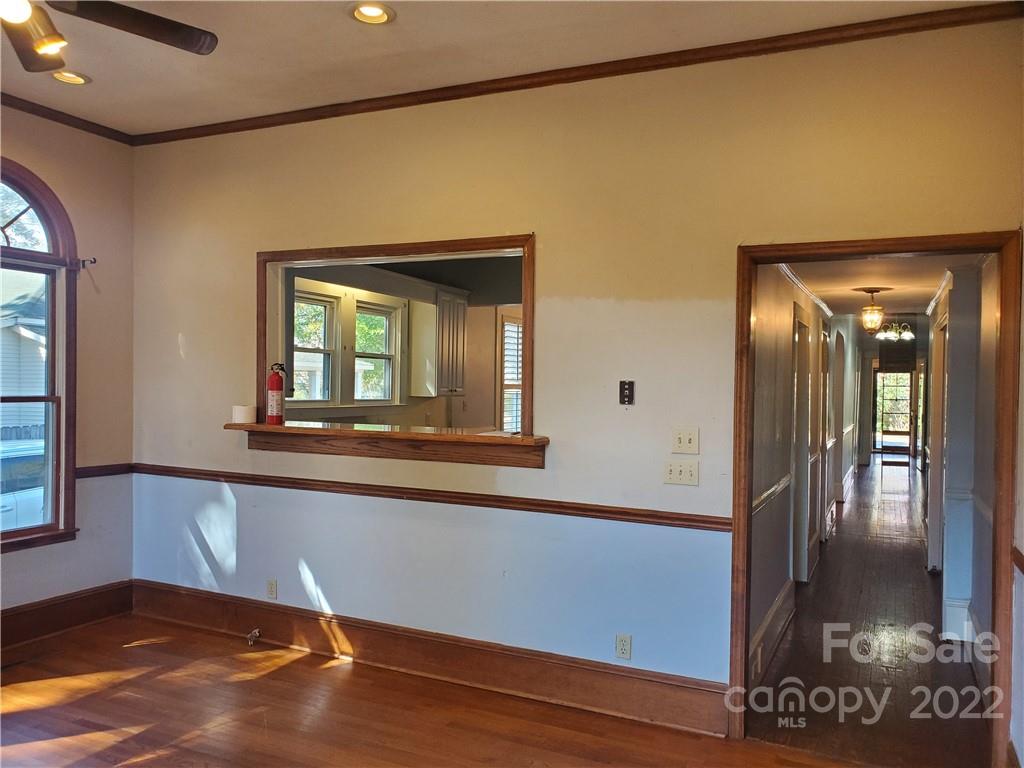 107 South Ridge Avenue, Unit 107 Kannapolis, NC 28083 - Photo 19 of 38 a view of a hallway with wooden floor and front door