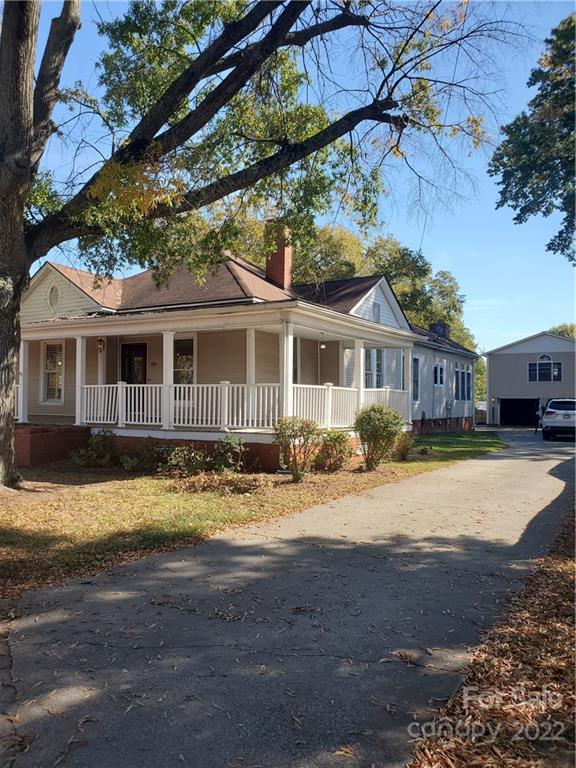 107 South Ridge Avenue, Unit 107 Kannapolis, NC 28083 - Photo 2 of 38 a view of a house with a swimming pool