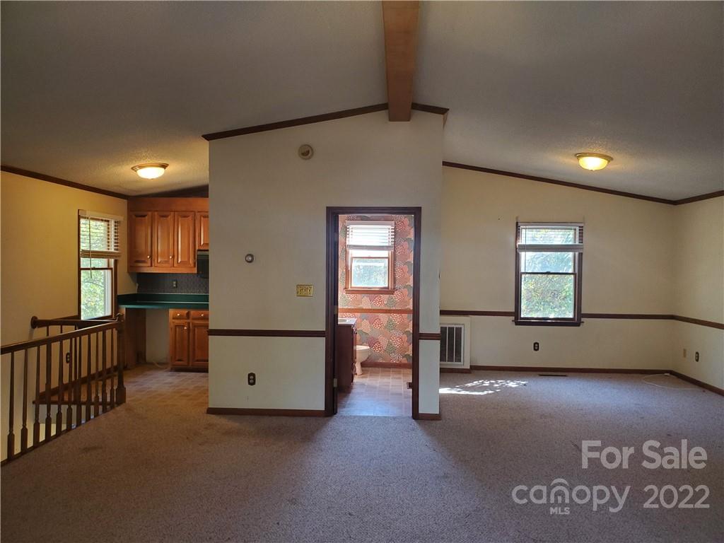 107 South Ridge Avenue, Unit 107 Kannapolis, NC 28083 - Photo 30 of 38 a view of an empty room with a window