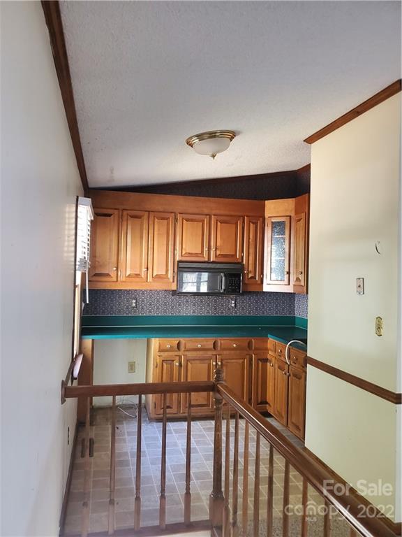 107 South Ridge Avenue, Unit 107 Kannapolis, NC 28083 - Photo 32 of 38 a view of a hallway with furniture and window