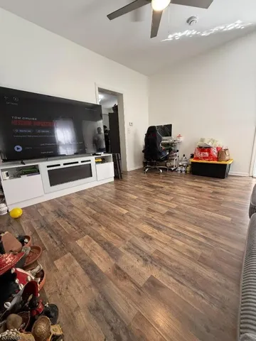 a kitchen with a sink and a stove top oven