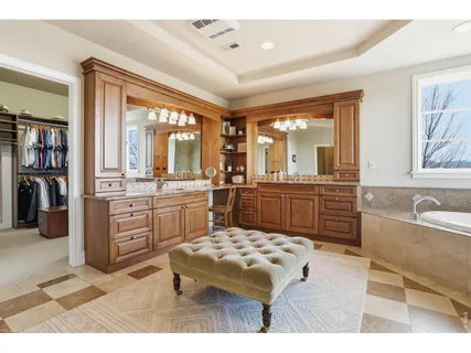 a kitchen with a stove a sink and a refrigerator