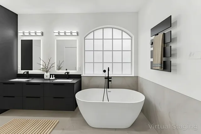 a bathroom with a bathtub and a sink