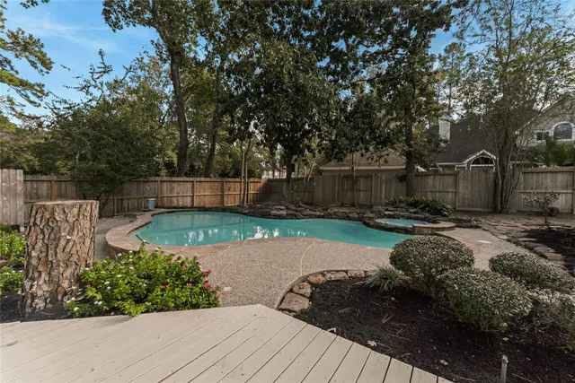 a view of a backyard with a garden