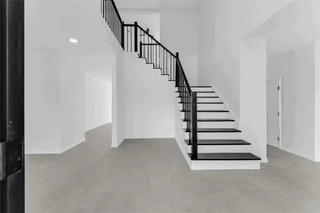 a view of entryway with wooden floor