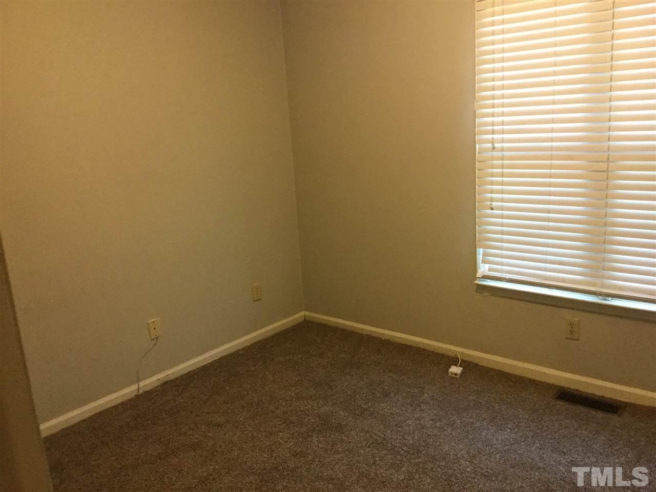 1522 Bennett Street Raleigh, NC 27604 - Photo 6 of 12 an empty room with a window