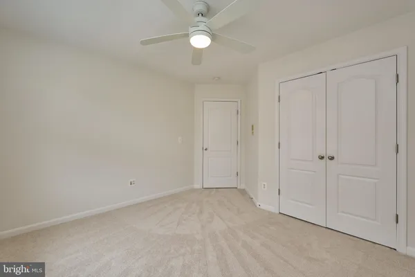 a bathroom with a sink a mirror and a toilet