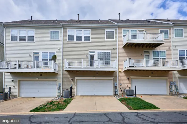 a view of a building with a yard