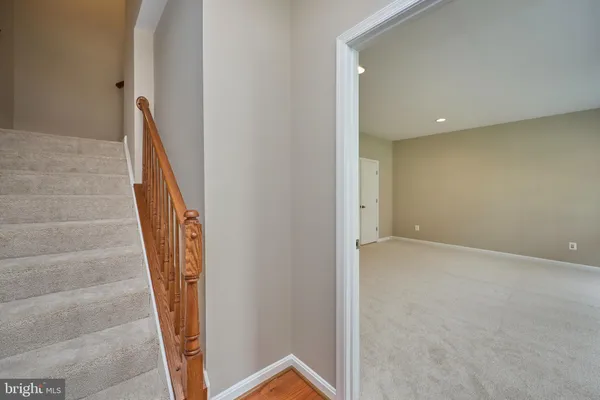 a view of hallway with stairs