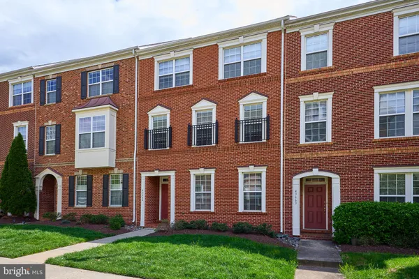 a living room with furniture and window