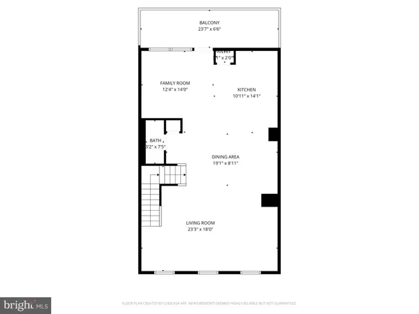 a kitchen with stainless steel appliances a dining table chairs and wooden floor