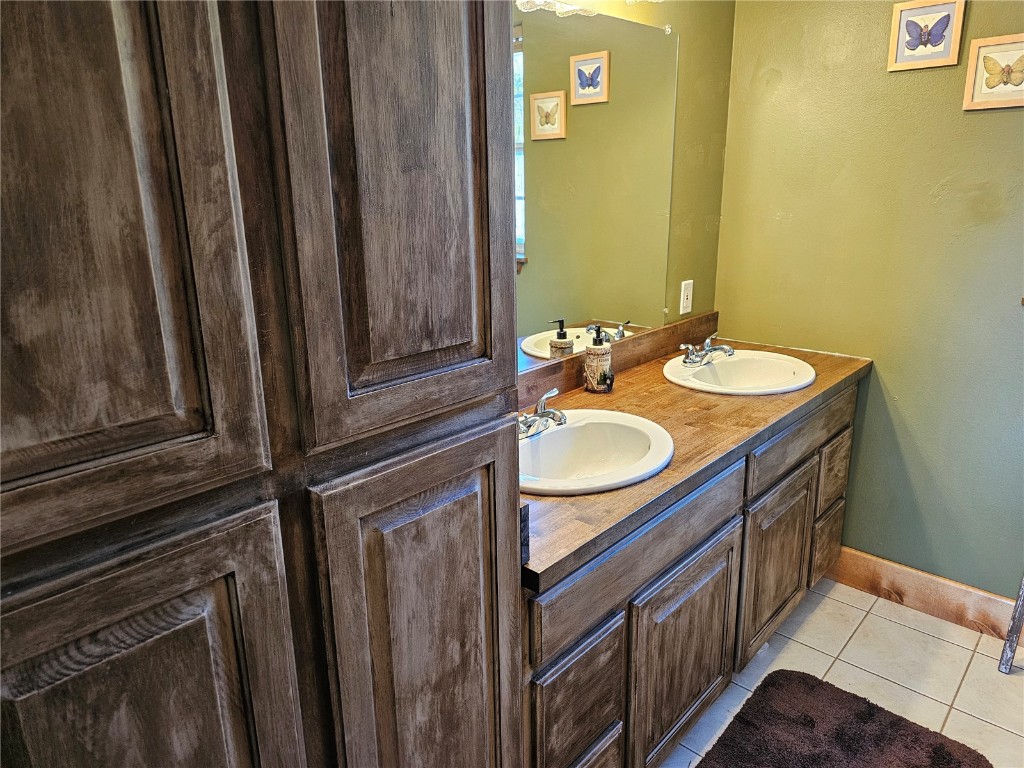26 Vine Road Fairplay, CO 80440 - Photo 31 of 40 Bathroom with tile flooring and double sink vanity