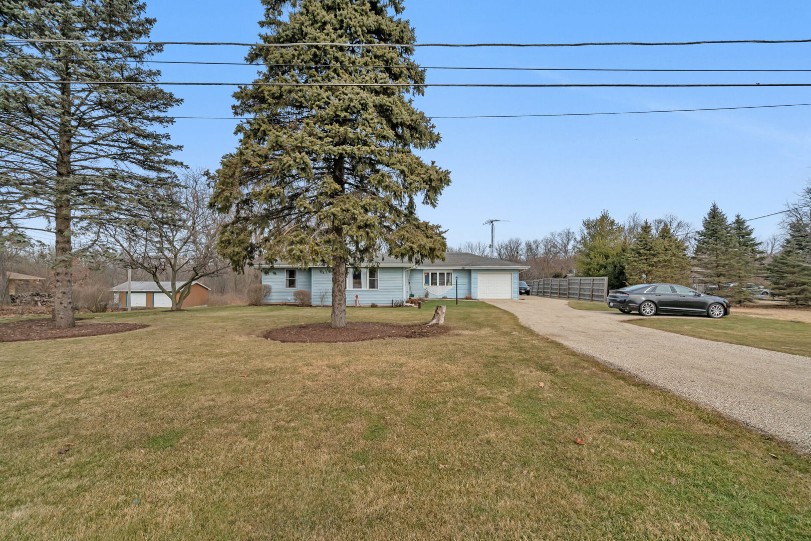 19556 West Manhattan Road Elwood, IL 60421 - Photo 3 of 23 a view of road with large trees